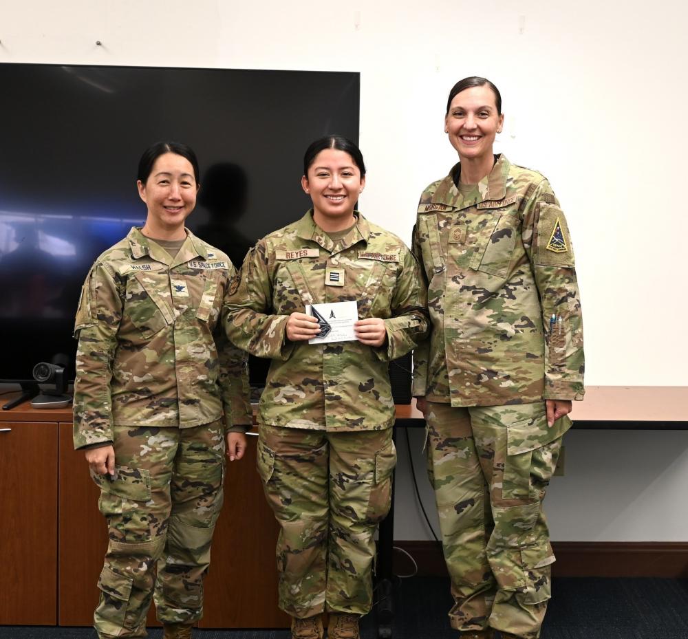 DVIDS – Images – Cadet Reyes poses for a photo with SBD 3 commander after receiving her USSF patch [Image 7 of 7]