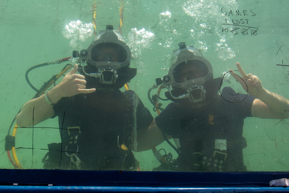 DVIDS – News – Making a Splash: EA2 Baker Reenlists Underwater During Fleet Week 2025